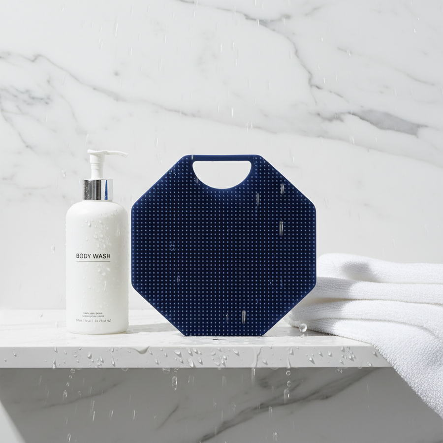 Silicone body scrubber in a bright shower routine setup for different skin types.