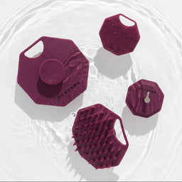 ScrubMe 4-Piece Shower Tool Set in Passionate Purple styled floating in water