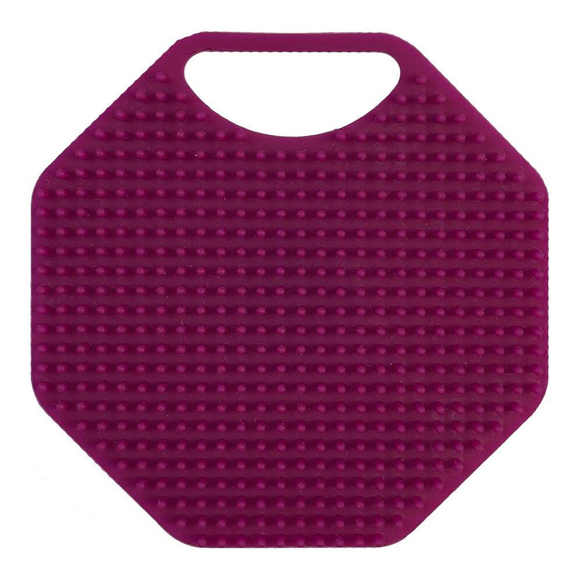 Front-on view of the ScrubMeFace Passionate Purple silicone face scrubber bristle side showing even exfoliating texture.