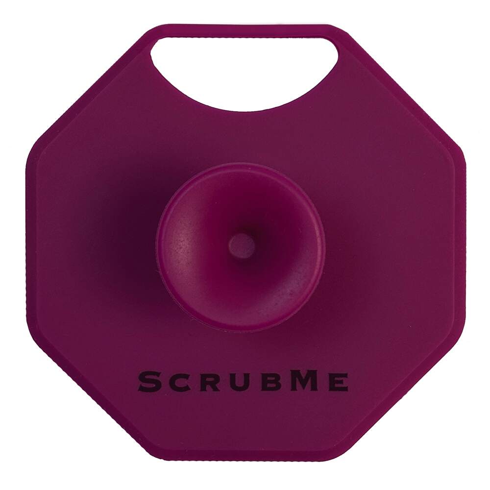 ScrubMeFace Passionate Purple silicone face scrubber front view showing ergonomic handle and central grip.