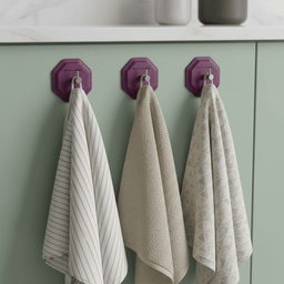 Three Passionate Purple HookMe hooks in horizontal row on sage green cabinet end panel